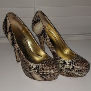 Bakers snake skin platform pumps